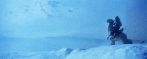 Tauntaun with rider running across snowscape