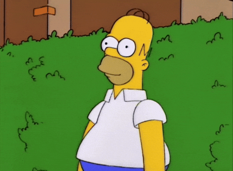 Homer Simpson Gif backing and disappearing into the bushes
