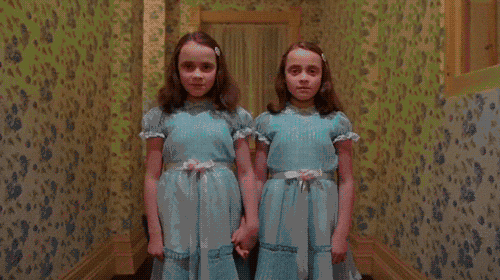 Animated gif of the two twins from The Shining