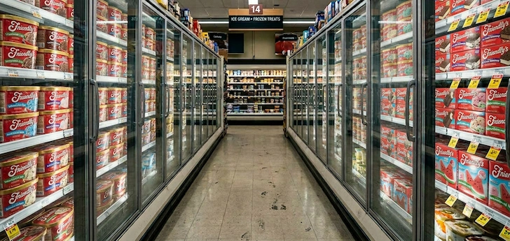 Long aisle of a supermarket ice cream section featuring only Friendly's products.
