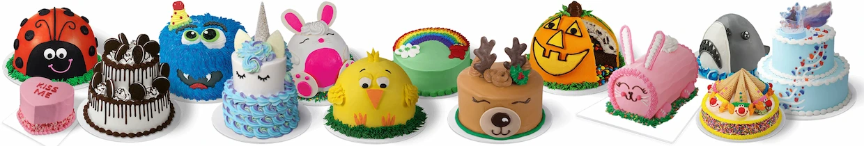 A lineup of 12 novelty Baskin-Robbins ice cream cakes on a white background, including designs shaped like a ladybug, a cookies and cream drip cake, a blue monster with a party hat, a unicorn, a bunny, a yellow chick, a cake with a rainbow topper, a reindeer, a jack-o'-lantern pumpkin, a pink bunny roll cake, a shark, a circus tent, and a light blue two-tiered cake with sprinkles.