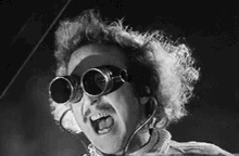 Animated gif of Gene Wilder ripping off his goggles after bring to life his monster in the film ‘Young Frankenstein’