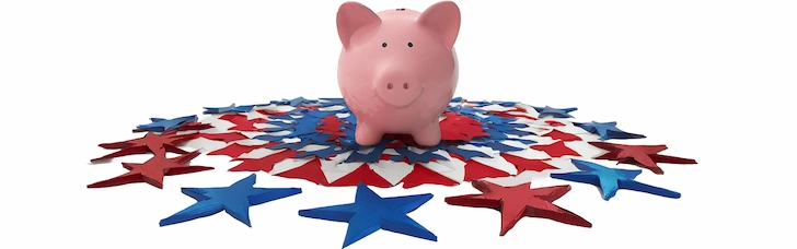 Piggy bank standing in the middle of red and blue stars.